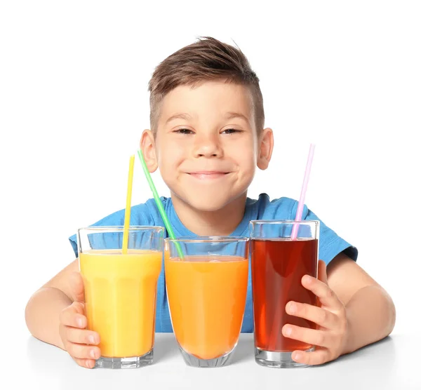 Söt liten pojke med glas juice — Stockfoto