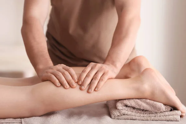 Young woman having legs massage — Stock Photo, Image