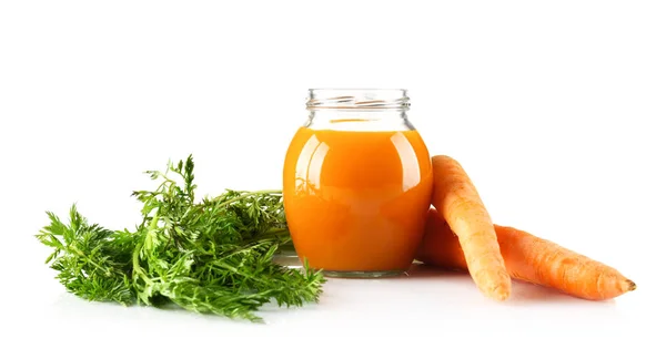 Frasco de suco e cenouras frescas — Fotografia de Stock