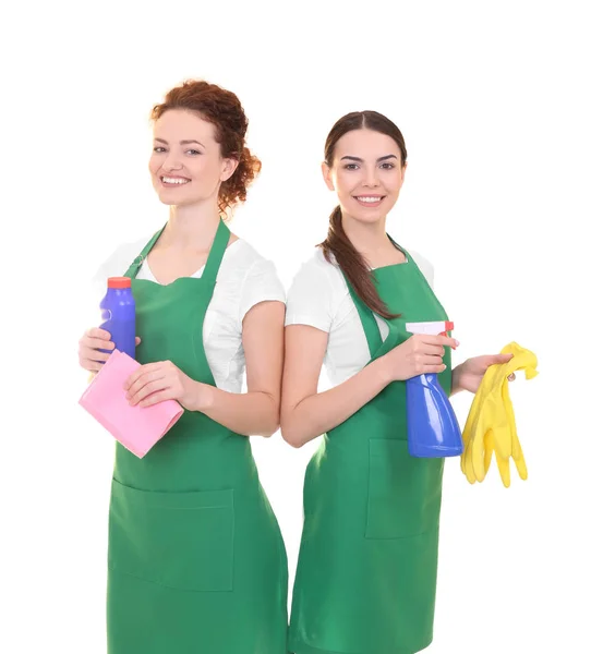 Schoonmaakpersoneel in groene schorten op witte achtergrond — Stockfoto