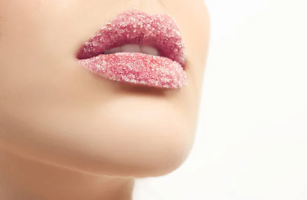 Lips of young woman covered with sugar — Stock Photo, Image