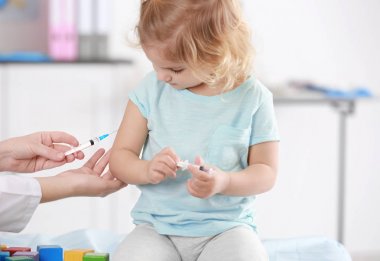 Doktor Çin çocuk ışık arka plan üzerinde