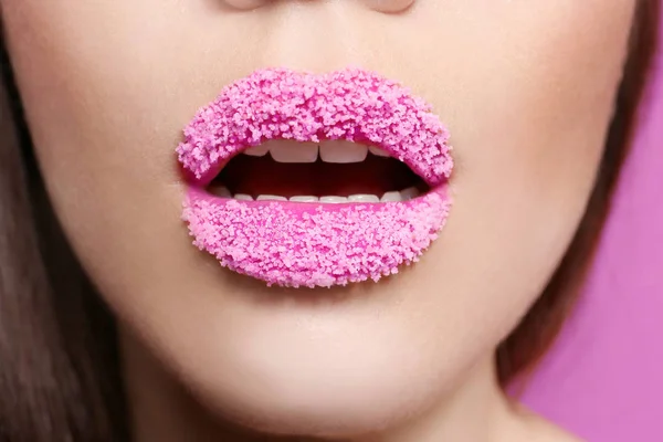 Lips of young woman covered with sugar — Stock Photo, Image