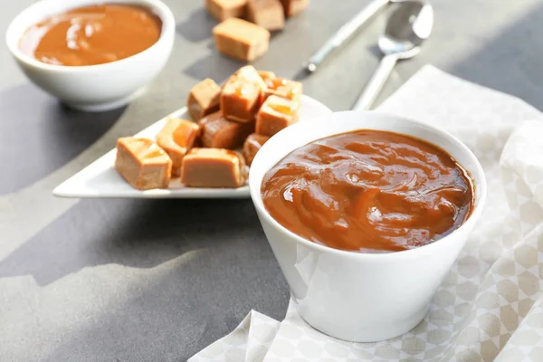 Tasty caramel sauce — Stock Photo, Image