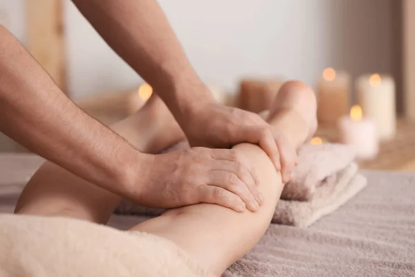 Young woman having legs massage — Stock Photo, Image