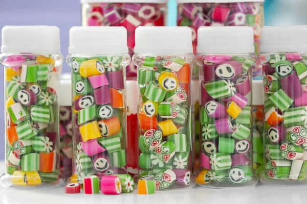 Different candies in jars — Stock Photo, Image