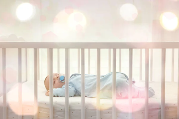 Lovely baby sleeping in cradle — Stock Photo, Image