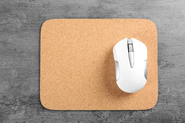 Blank mat and wireless mouse — Stock Photo, Image