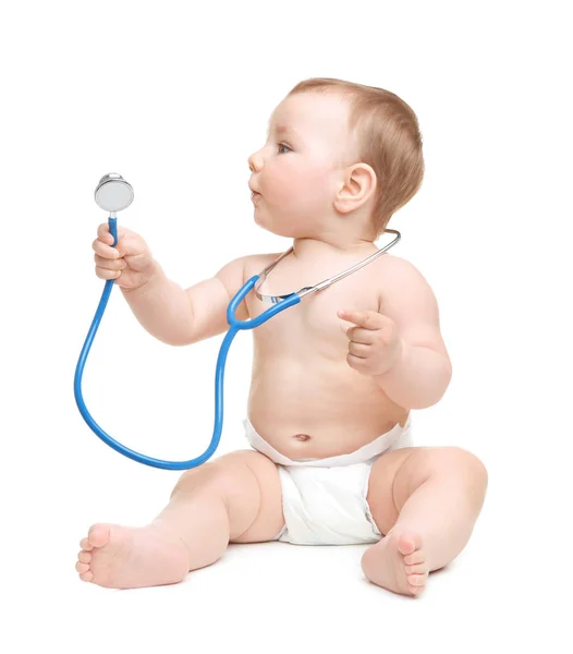 Söpö pieni vauva stetoskoopilla — kuvapankkivalokuva