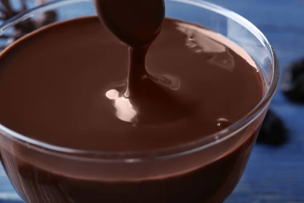 Glass of delicious chocolate sauce — Stock Photo, Image