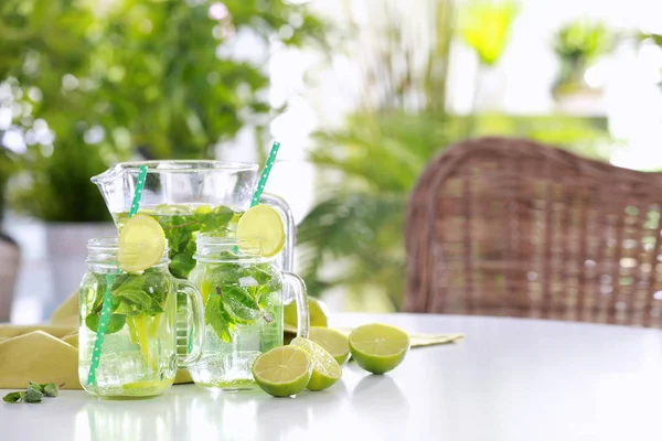 Glassware with refreshing lemonade — Stock Photo, Image