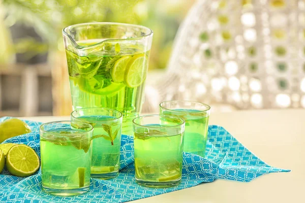 Glassware with refreshing lemonade — Stock Photo, Image