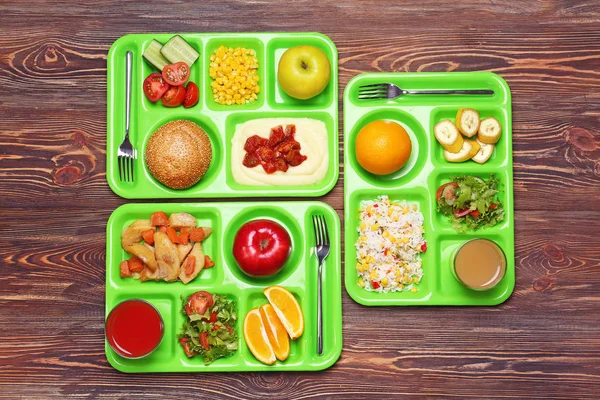 Serving tray with delicious food on table — Stock Photo, Image