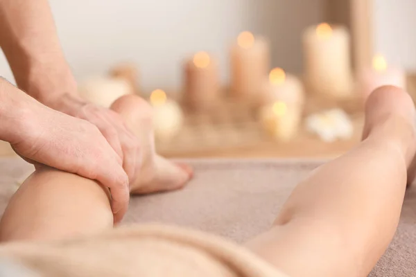 Young woman having legs massage — Stock Photo, Image