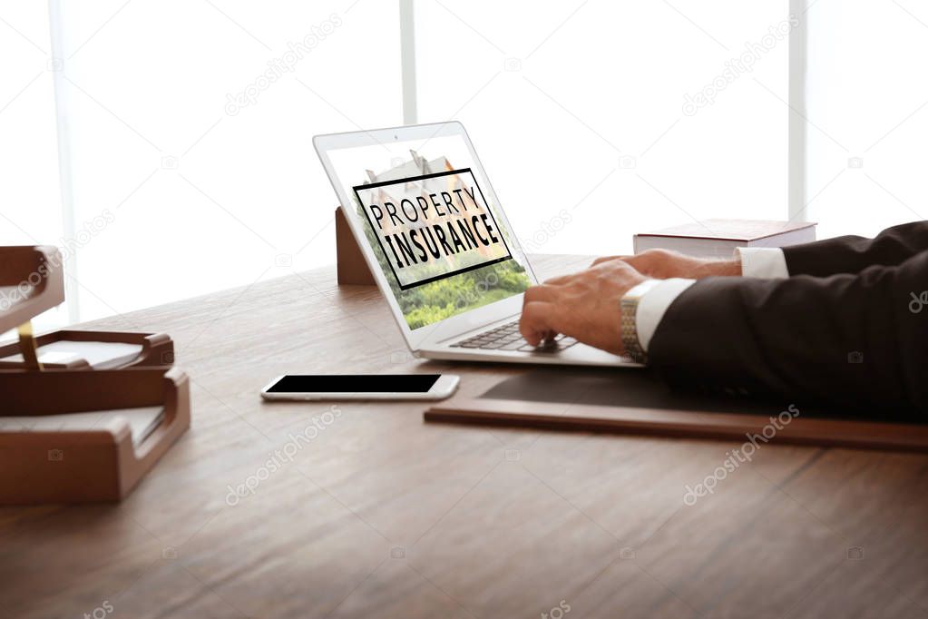 Man using laptop in office