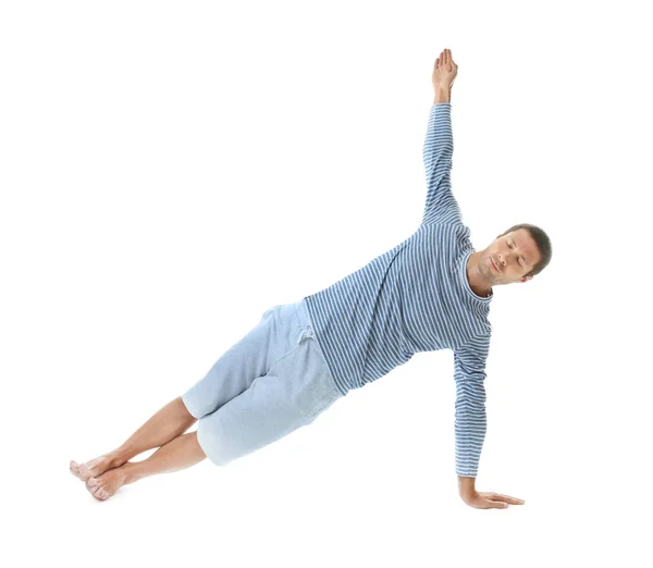 Młody człowiek praktykujący jogę — Zdjęcie stockowe