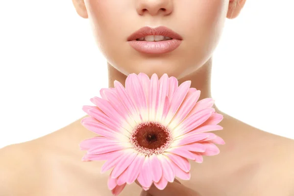 Woman with lips makeup and flower — Stock Photo, Image