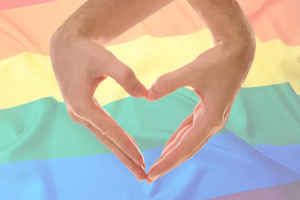 Gay pár srdce s rukama — Stock fotografie