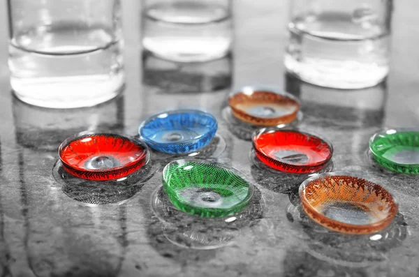 Bottles with contact lenses — Stock Photo, Image