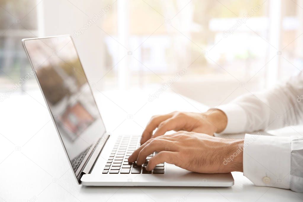 Man using laptop for browsing internet 