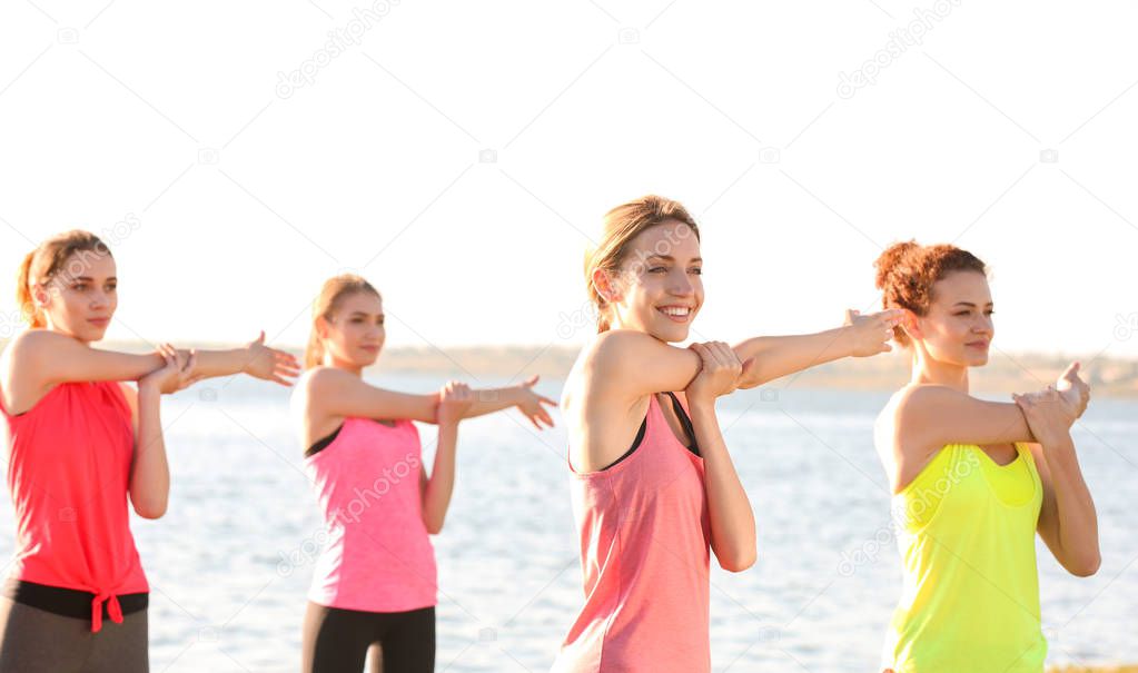 women practicing yoga