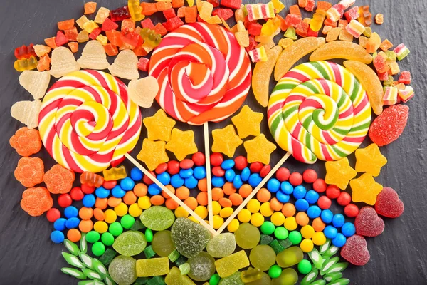 Composizione di deliziose caramelle — Foto Stock