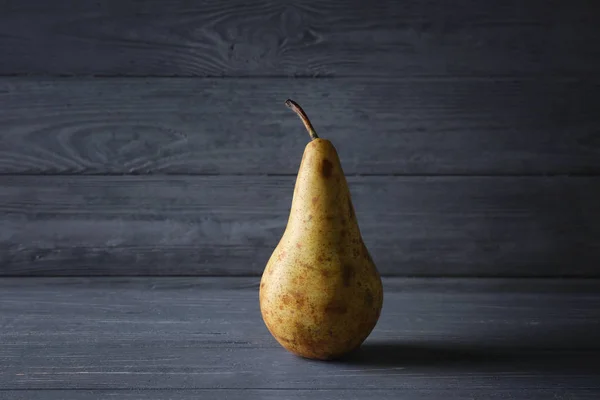 Yellow pear on  table — Stock Photo, Image