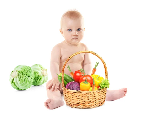 Schattige baby met groenten — Stockfoto