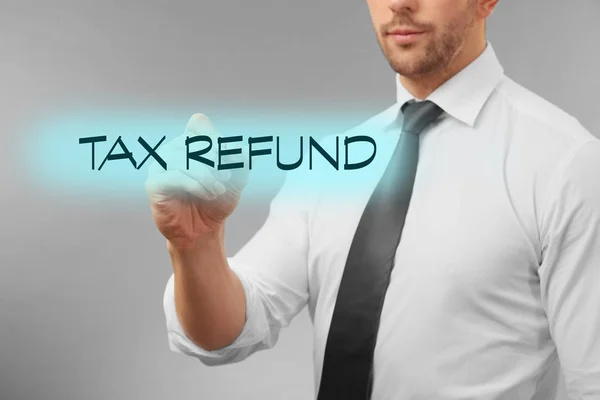 Zakenman wijzen op tekst Tax Refund — Stockfoto