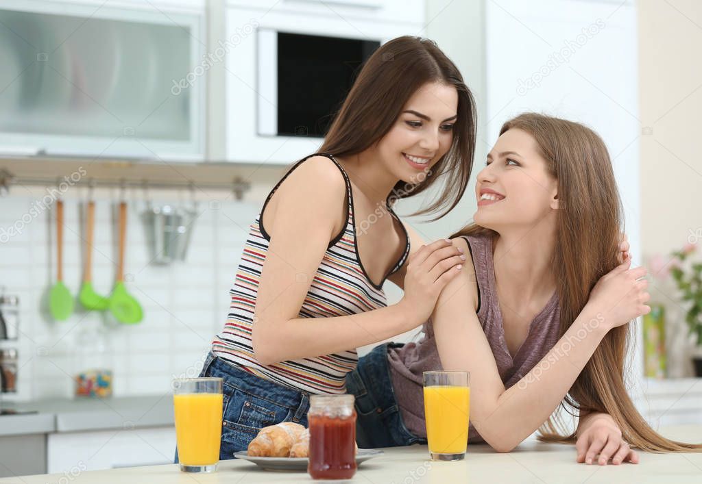 lesbian couple having breakfast 