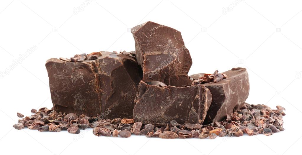 Pile of dark chocolate chunks and cocoa nibs 