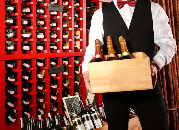 Sommelier with wine bottles — Stock Photo, Image