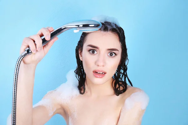 Young woman taking shower — Stock Photo, Image