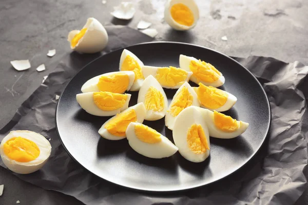 Plate with hard boiled sliced eggs — Stock Photo, Image