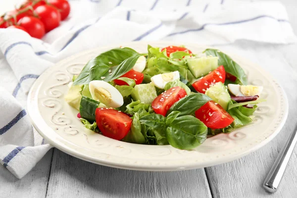 Plate of vegetable salad with eggs — Stock Photo, Image