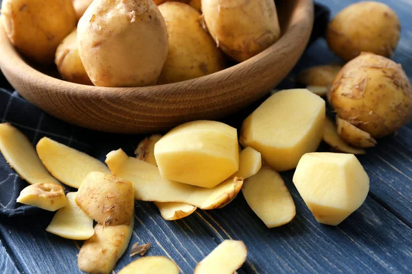 Composition with peeled potatoes — Stock Photo, Image