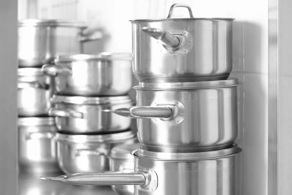 Cookware on table in kitchen — Stock Photo, Image