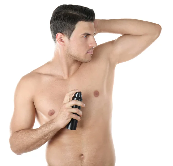 Young man with deodorant — Stock Photo, Image