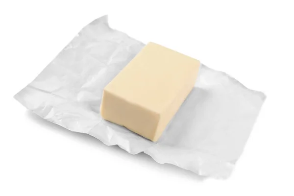 Emballage avec un morceau de beurre — Photo