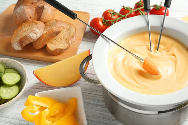 Cheese fondue in pot a — Stock Photo, Image