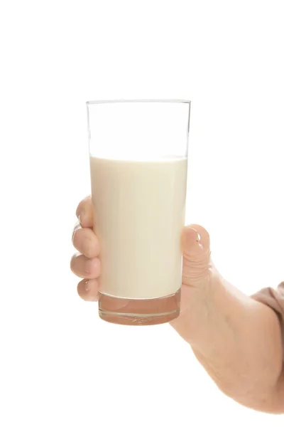 Vrouw bedrijf glas met melk — Stockfoto