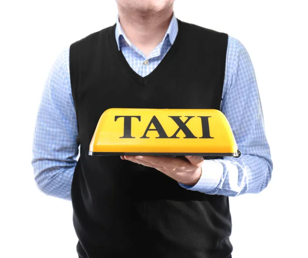 Человек с фонариком на крыше такси — стоковое фото
