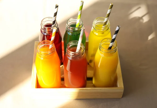 Delicious juices in bottles — Stock Photo, Image