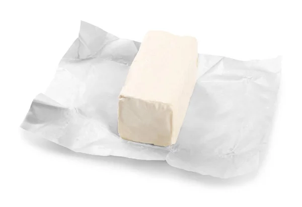 Verpackung mit einem Stück Butter — Stockfoto