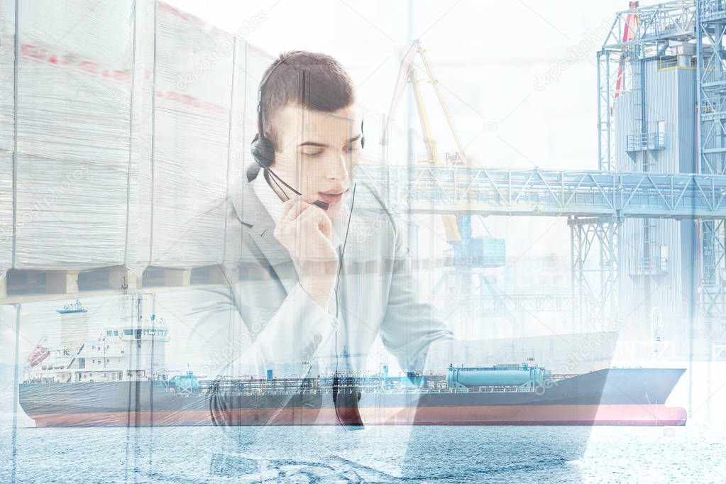 Double exposure of seaport and businessman with laptop. Wholesale and logistic concept