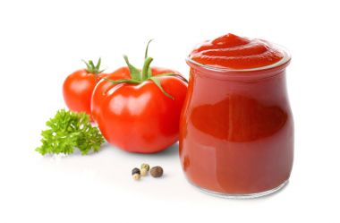 Glass jar with sauce and tomatoes clipart