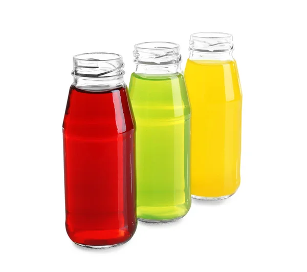 A palackok különböző gyümölcslevek — Stock Fotó