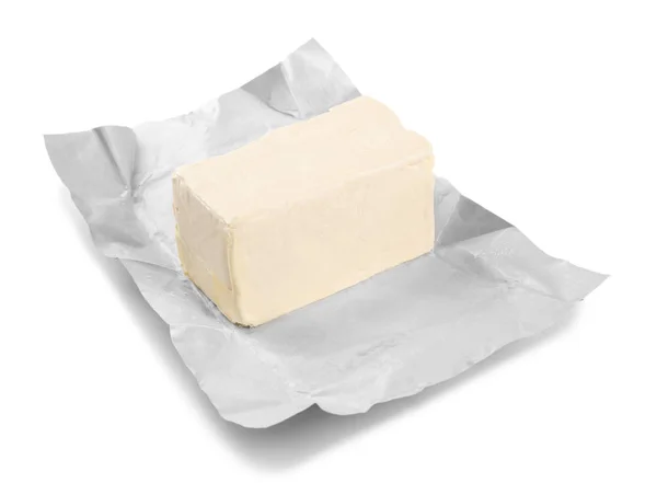 Verpackung mit einem Stück Butter — Stockfoto