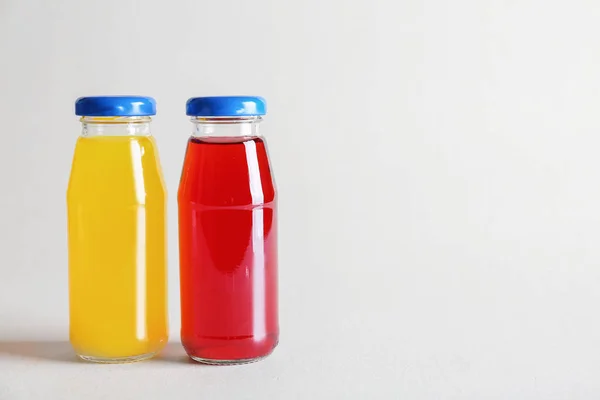 Delicious juices in bottles — Stock Photo, Image