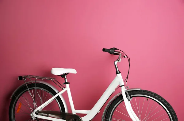 Bicycle on color background — Stock Photo, Image